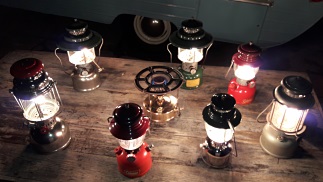 Coleman lanterns with 1956 Rainbow trailer.jpg