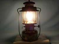 1301795606-Coleman_237_burning_Peerless_111_Mantle_opt.jpg