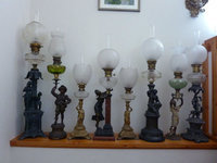 1317239911-8_of_my_figural_wick_lamps.jpg